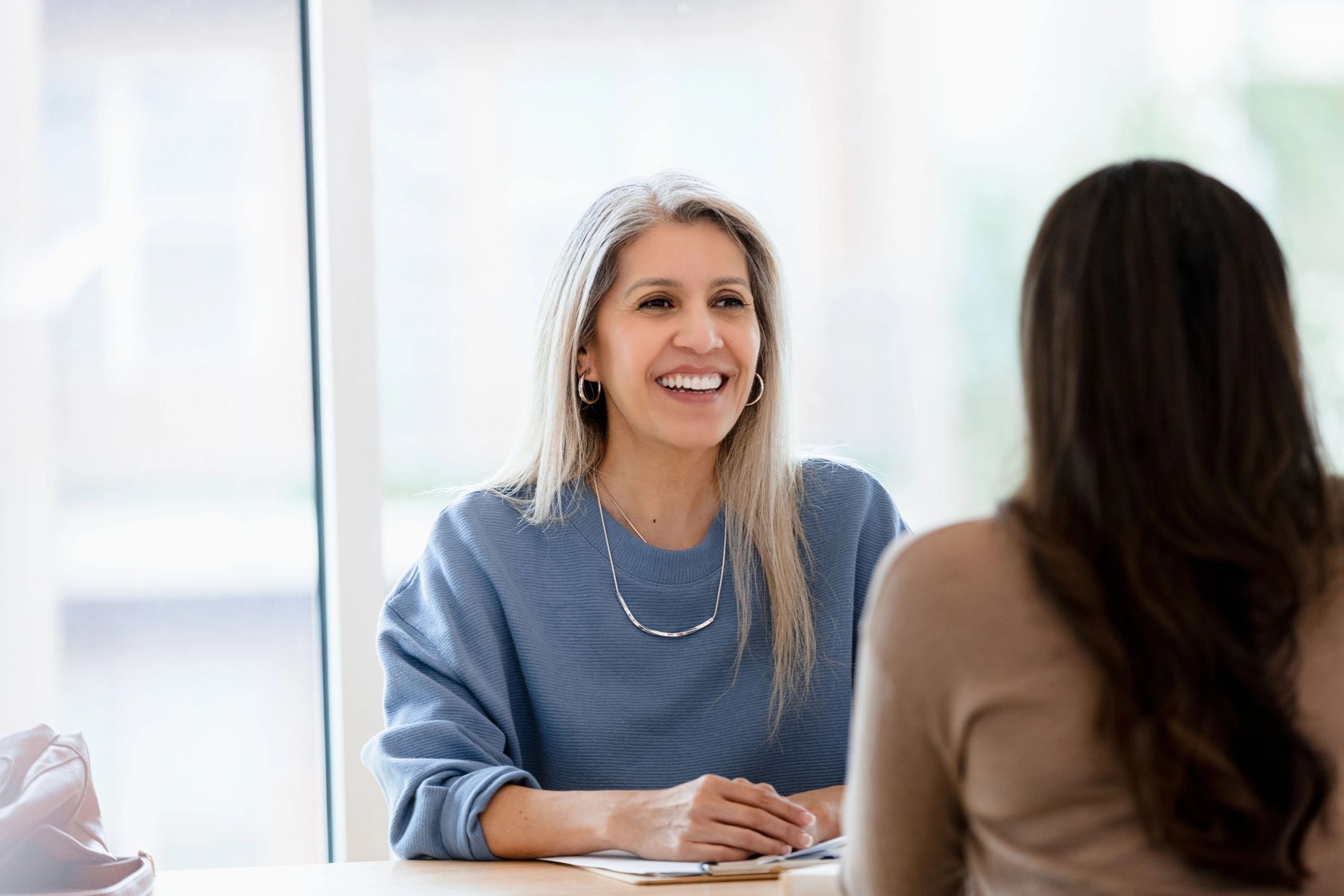 Lawyer consulting with a client in an office