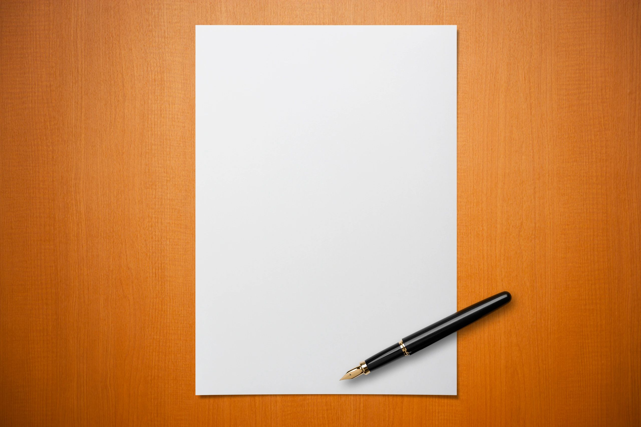 Desk with blank paper and pen for legal documentation