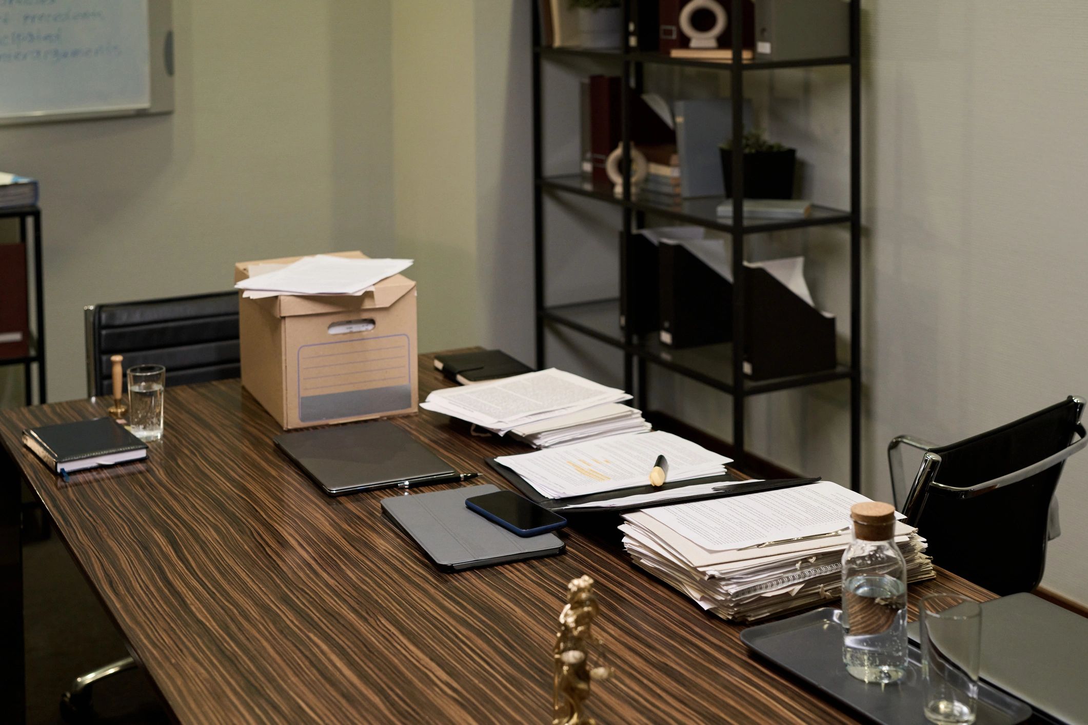 Office desk with legal documents and tablet